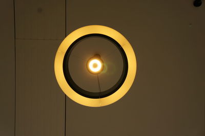 Low angle view of illuminated light bulb