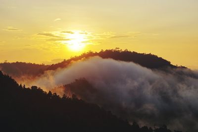 Scenic view of dramatic sky during sunset