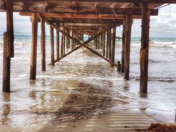View of pier on beach