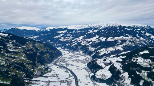 Scenic view of snowcapped mountains against sky