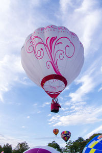 Low angle view of hot air balloon against sky