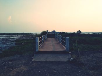 Scenic view of sea against clear sky during sunset