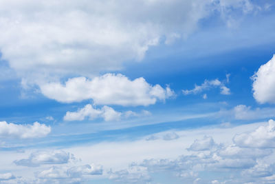 Fluffy clouds on blue sky. heaven background, copy space.