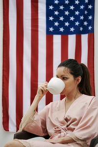 Young woman drinking water