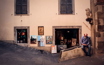 Man standing by window