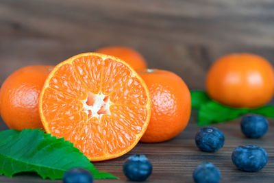 Close-up of orange fruits on table