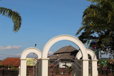 Low angle view of building against clear blue sky