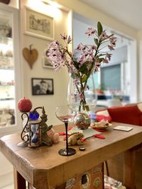 Flower vase on table at home