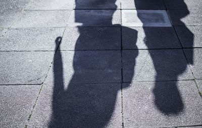 Shadow of people on wall