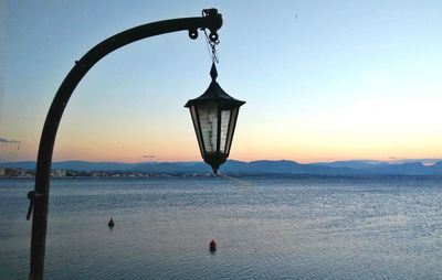 Scenic view of sea against sky at sunset