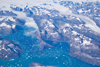 High angle view of snowcapped mountains during winter