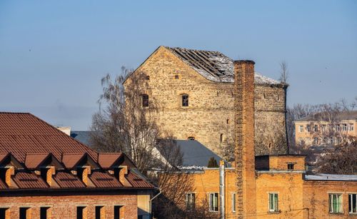 Historical buildings on the old street of kamianets-podilskyi old town quarter on a  winter morning