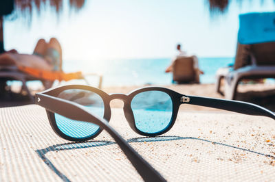 Close-up of sunglasses on table