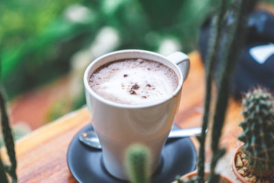 Close-up of cappuccino on table