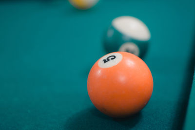 Close-up of pool balls on table