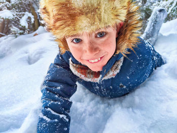 Portrait of young woman in snow