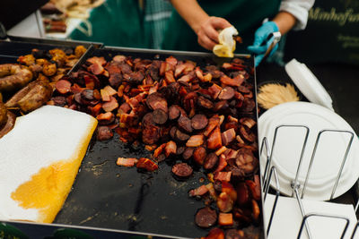 Midsection of person preparing food