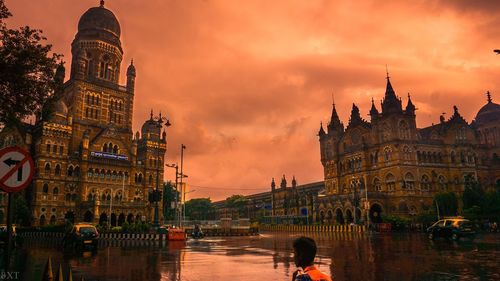 View of buildings against cloudy sky