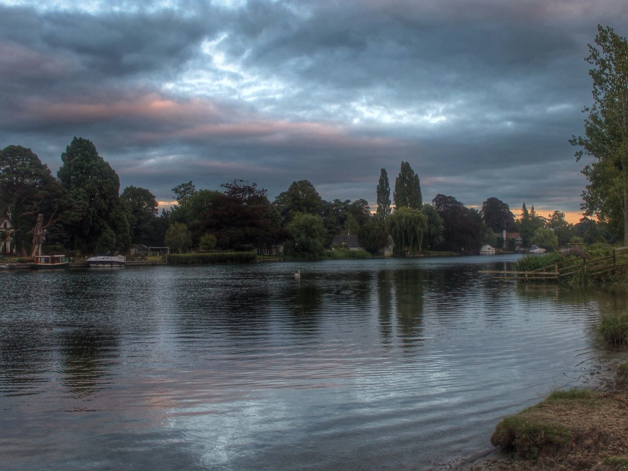 water, sky, cloud - sky, cloudy, reflection, lake, river, tranquil scene, tranquility, scenics, beauty in nature, nature, waterfront, cloud, built structure, tree, overcast, weather, idyllic, architecture