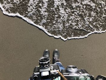 High angle view of skateboard on beach