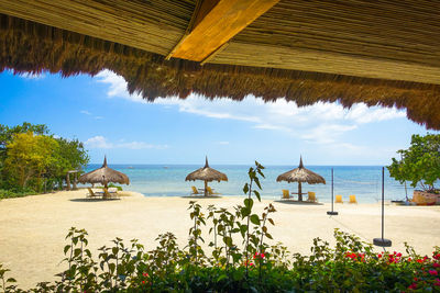 Scenic view of beach against sky