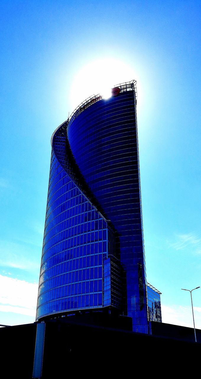 LOW ANGLE VIEW OF FACTORY AGAINST SKY