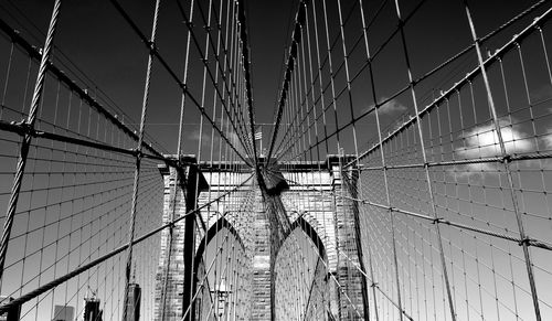 Low angle view of brooklyn bridge against sky