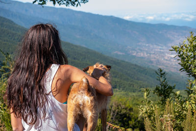 Rear view of woman in mountains