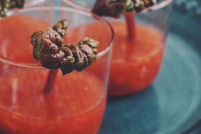 High angle view of rhubarb soup served in glasses