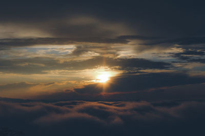 Low angle view of dramatic sky during sunset