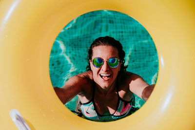 Portrait of smiling girl in swimming pool