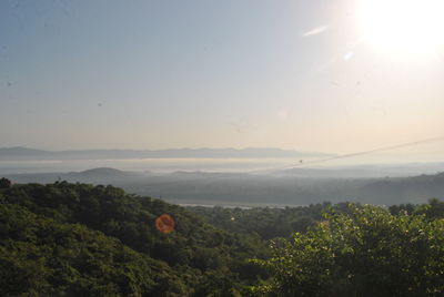 Scenic view of landscape against sky during sunset