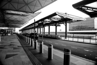 Empty railroad station platform in city