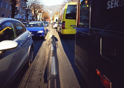 Cars on road in city