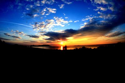 Scenic view of silhouette landscape against sky during sunset