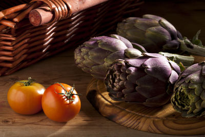 Close-up of fruits in basket on table