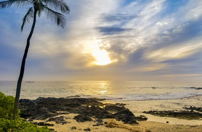 Scenic view of sea against sky at sunset