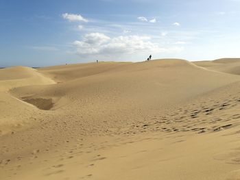 Scenic view of desert against sky