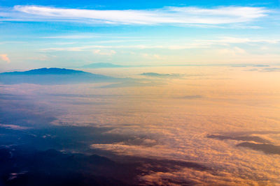 Scenic view of dramatic sky over landscape