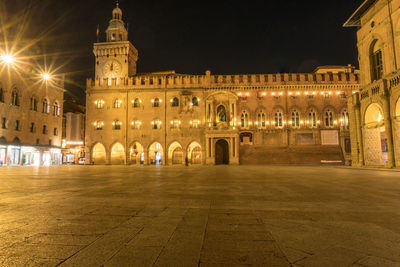 Illuminated buildings in city at night