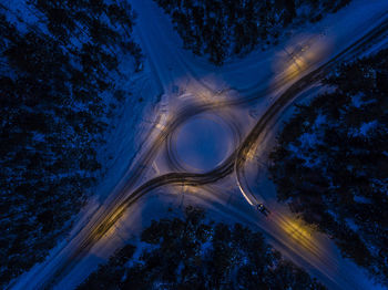 Directly above shot of traffic circle at night during winter