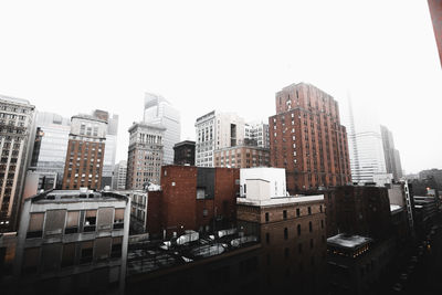 Cityscape against clear sky