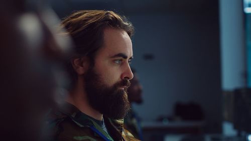 Close-up of young man looking away