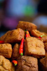 Street foods displays tahu or tofu in semarang. indonesia. in chinese new year 2023