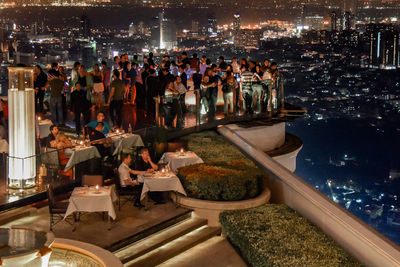 Group of people in restaurant at night