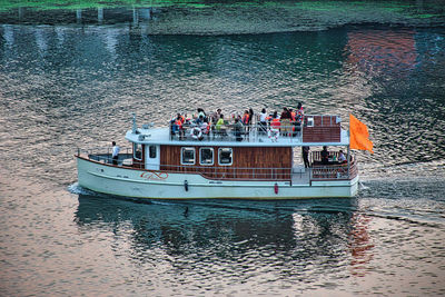 People on boat sailing in sea