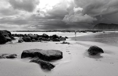 Scenic view of beach against sky