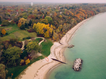 High angle view of bay against clear sky