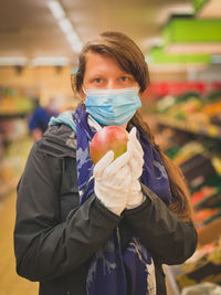 Portrait of woman holding ice cream