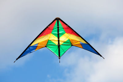 Low angle view of flag against sky